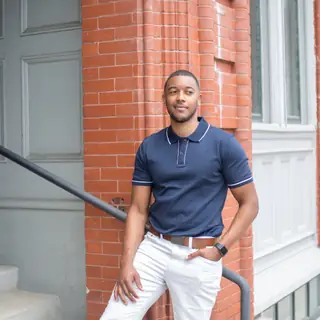 Portrait of a musician on a doorstep